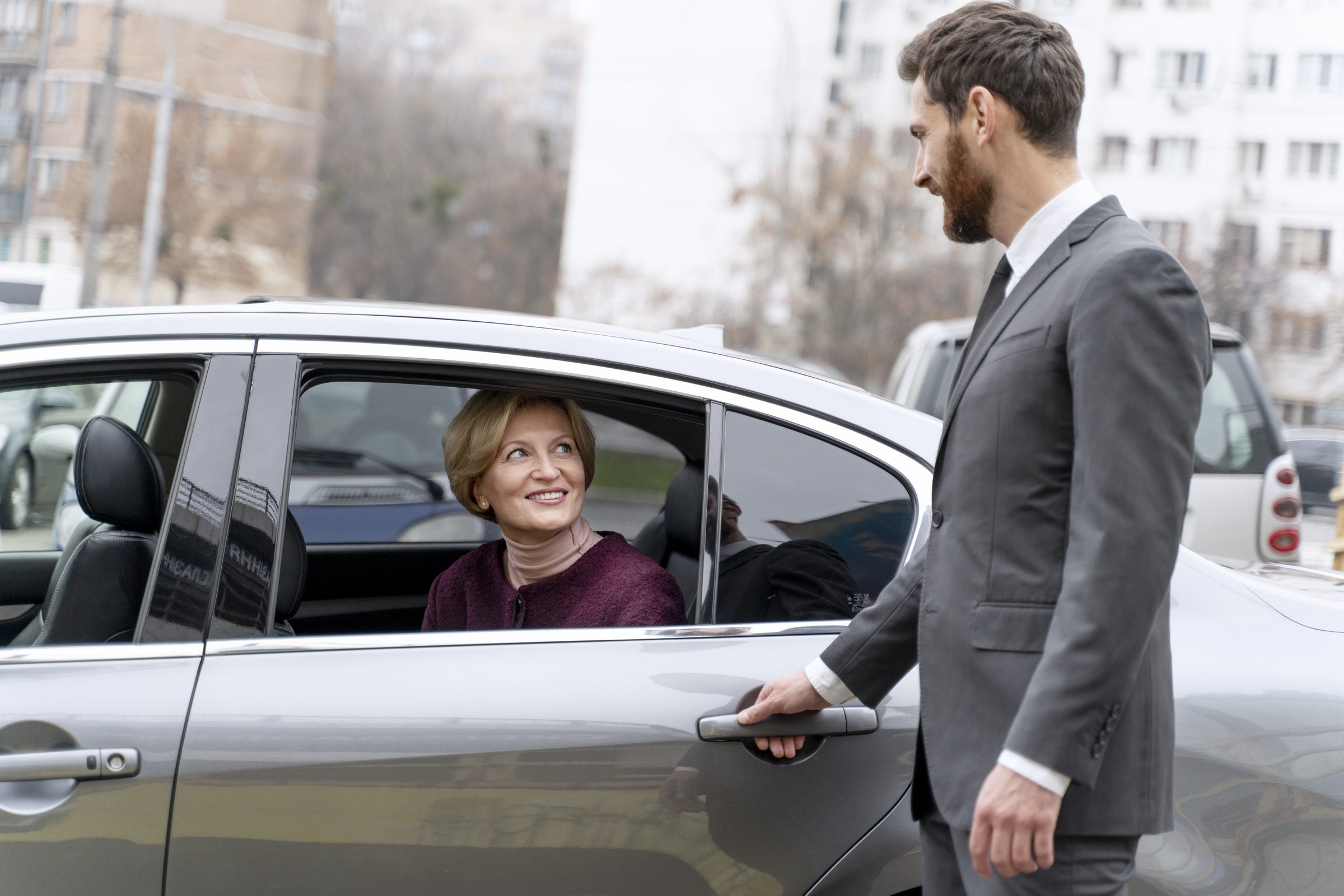 Chauffeur greets passenger