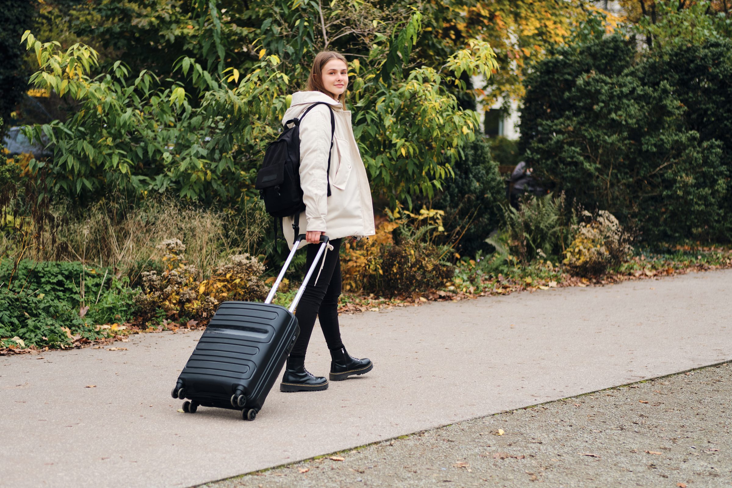 Student with suitcase